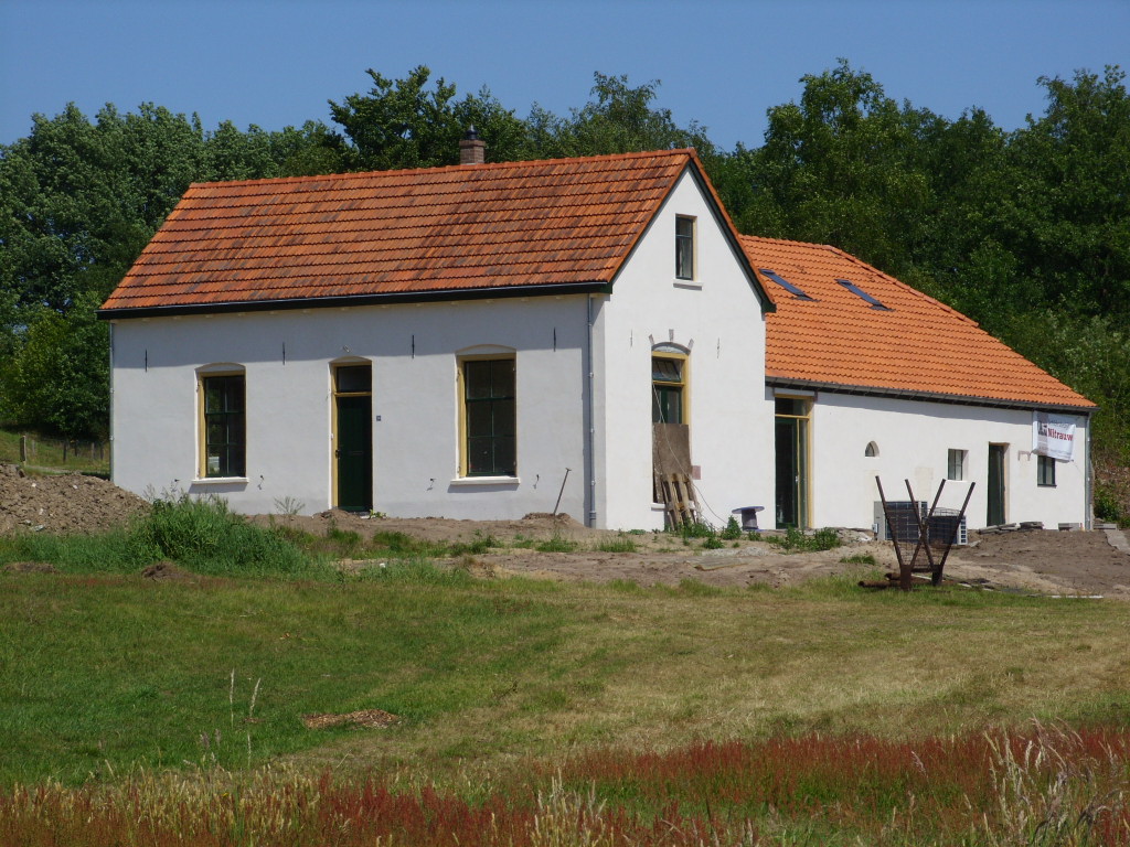 Gerestaureerde molenaarwoning bij Molen de Vlijt in Wapenveld.